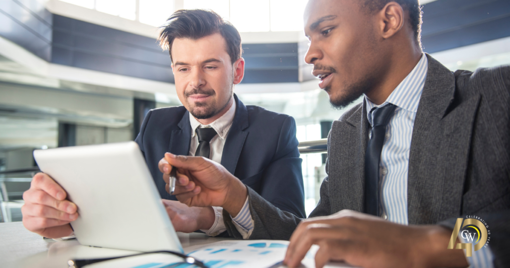 Two Business Men working on setting up IT services