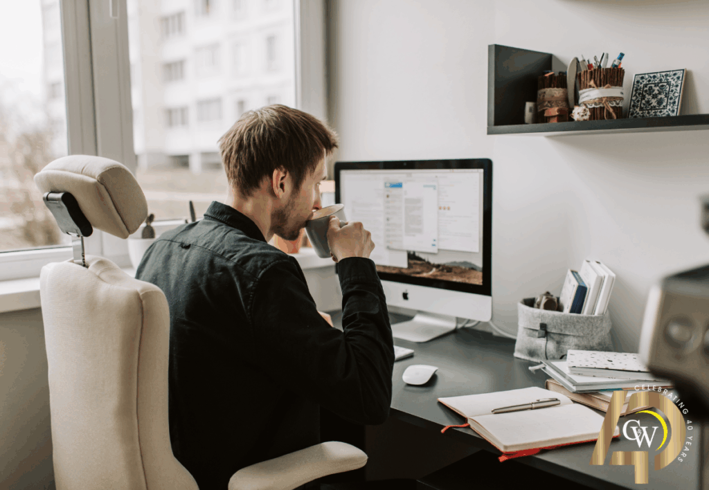 man searching for managed it provider on computer
