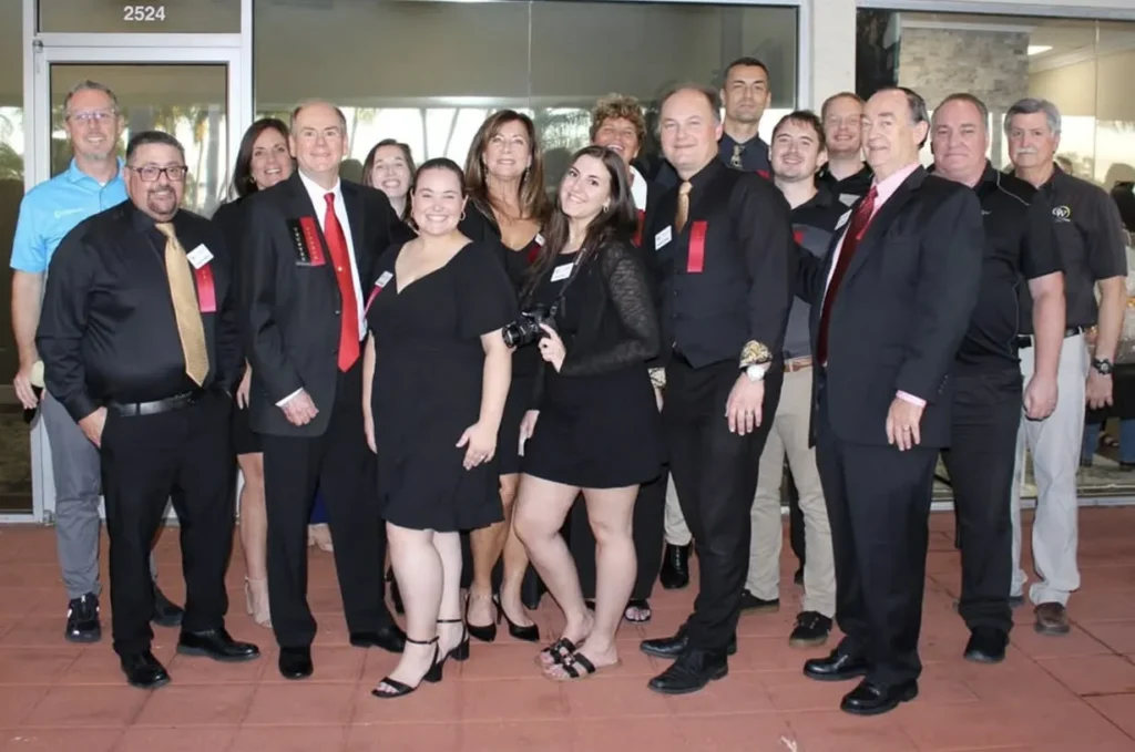 C&W Technologies staff with local business owners at a Stuart chamber of commerce event.